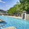 a pool with a building in the background