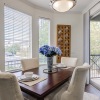 a dining room with a table and chairs