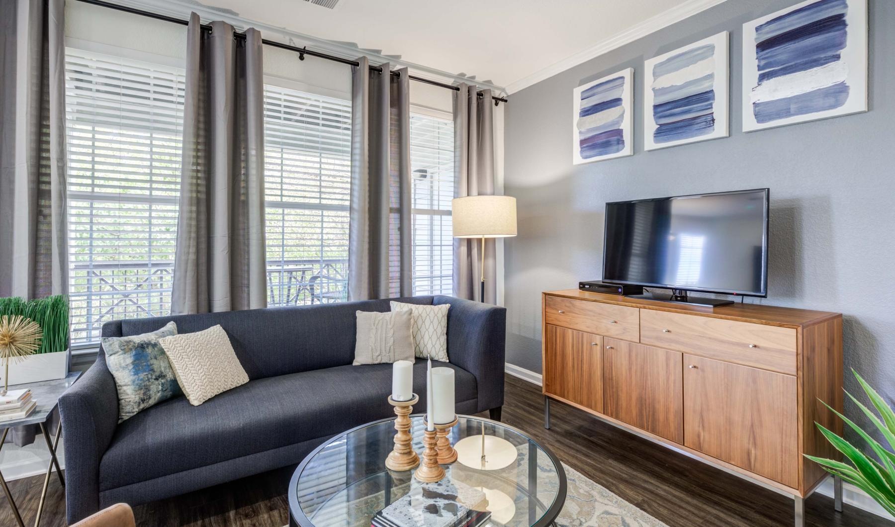 a living room with a tv and a couch