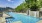 a pool with a waterfall