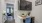 an office area with a table and chairs