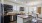a kitchen with a table and chairs