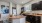 a kitchen with black cabinets